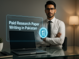 Paid Research Paper in Pakistan” by Qundeel.com placed on a modern desk with a laptop and notes, symbolizing professional academic writing services in Pakistan