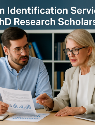 PhD scholar and mentor discussing research data and charts during a consultation, representing Qundeel.com’s Problem Identification Service for PhD research scholars